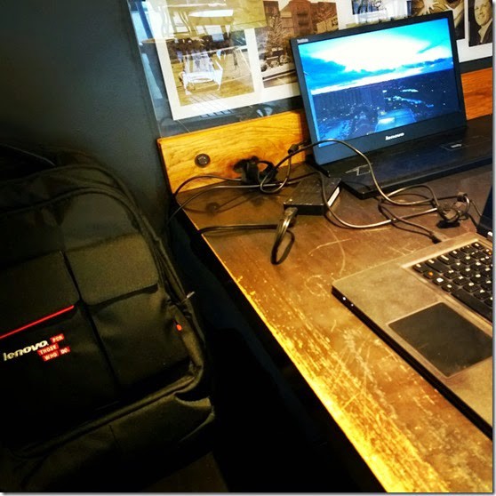 Image of laptop bag and open laptop